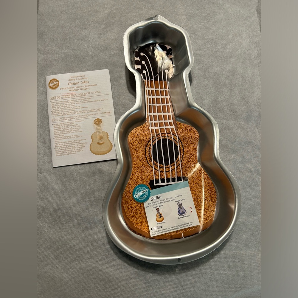NWTs Wilton Guitar Cakes.